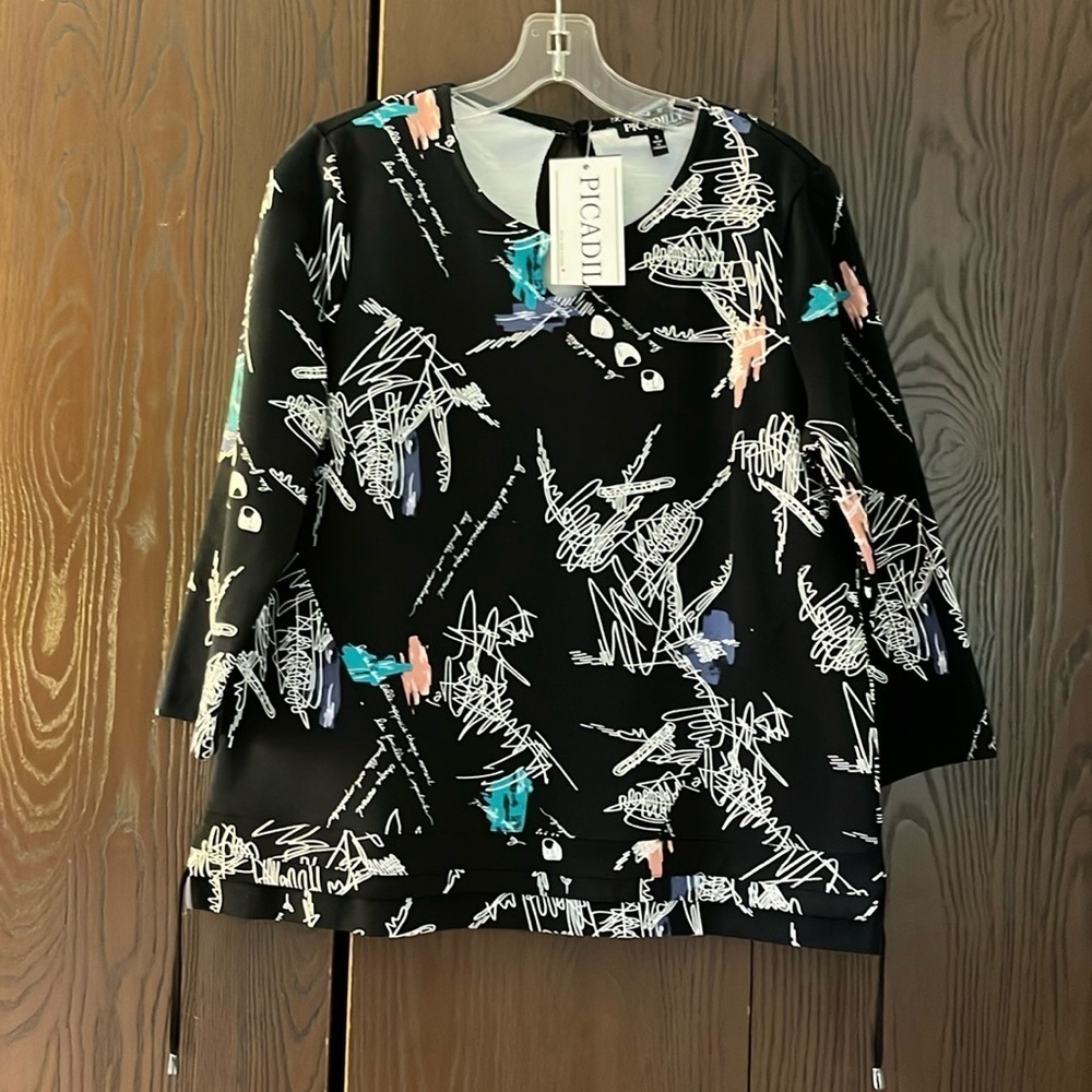Picadilly 3/4 sleeved black with artistic flair. Size Small. NWT